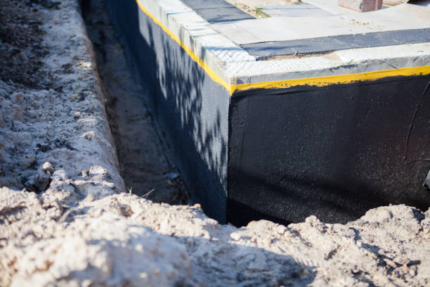 Professional Exterior Waterproofing technician working in Plymouth, NC